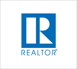 Blue Realtor logo on white background.